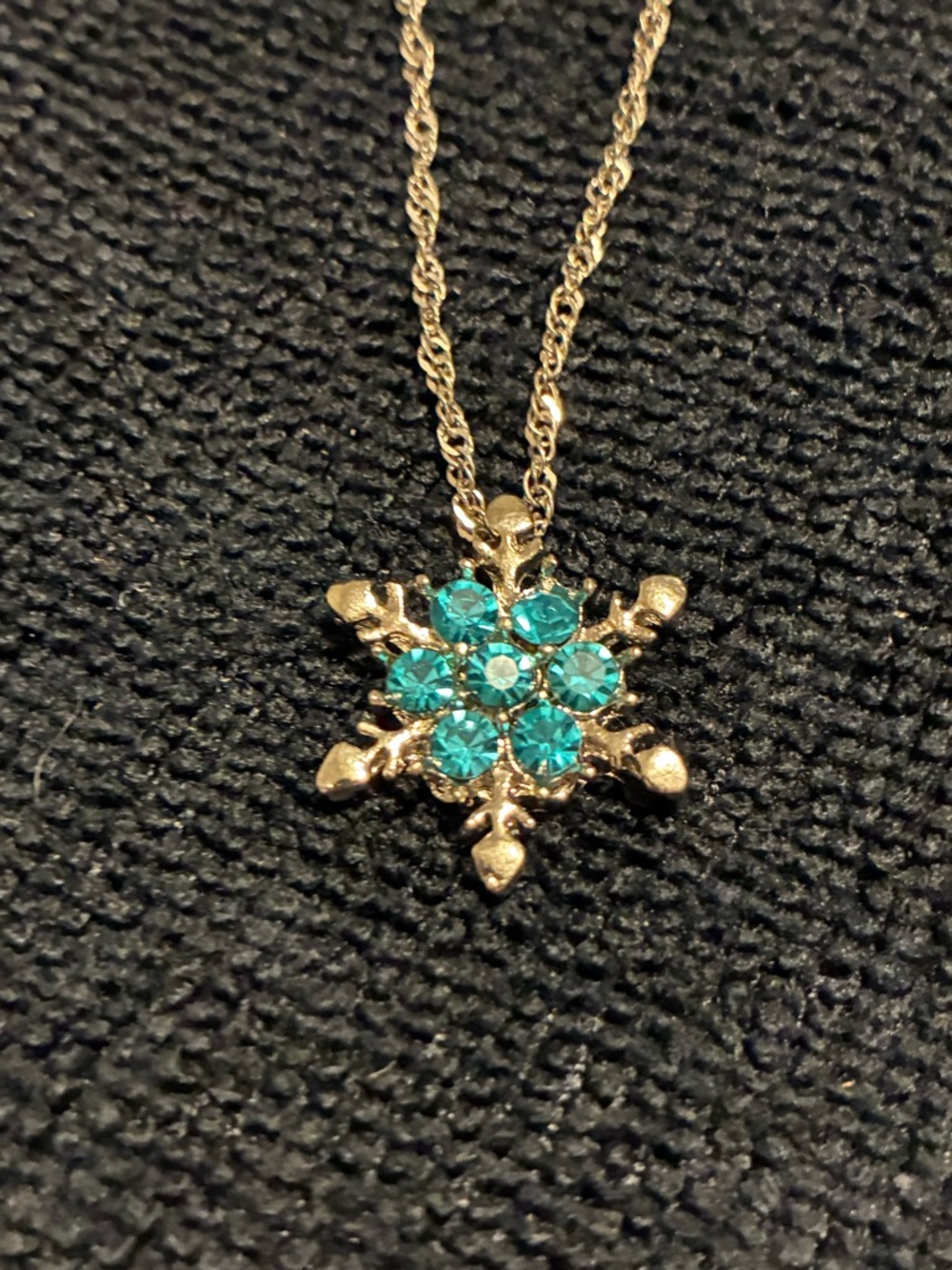 Gold Snowflake Pendant Necklace with Teal Crystals